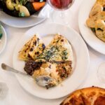 Grilled Za'atar Flatbread served with tapenade, muffaletta, and hummus at los olivos wine merchant cafe